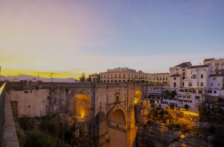 Close-up of the intricate stonework on the Puente Nuevo bridge in Ronda, Spain.