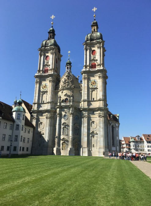 St. Gallen Abbey Cathedral, a Baroque masterpiece with twin towers dominating the skyline of the city.